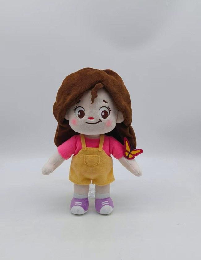 Approved pre-production sample of the girl character plush with a butterfly