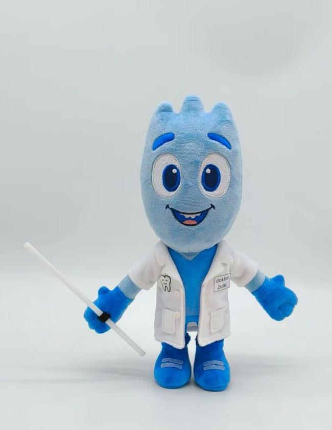 Approved pre-production sample of the blue dentist mascot plush