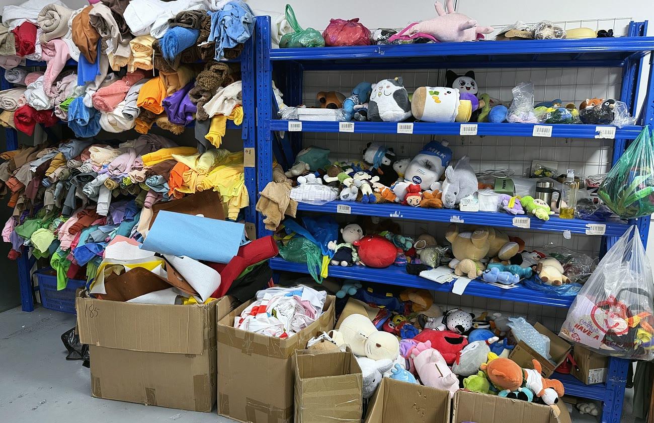 Plush fabric materials on the workshop shelves